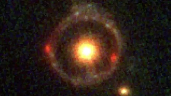 Exotic ‘Einstein Ring’ Suggests That Mysterious Dark Matter Interacts With Itself.