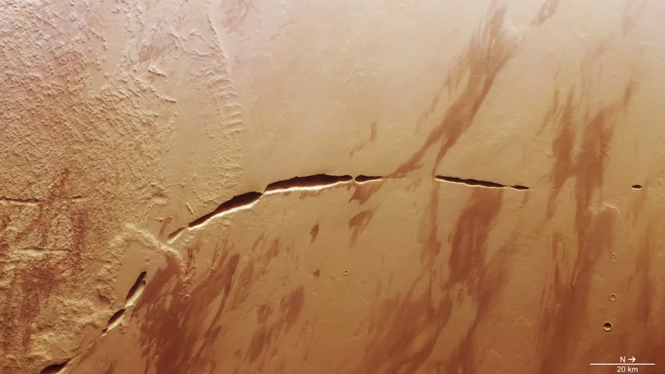 Mars Orbiter Captures Red Planet Scar That’s Longer Than The Grand Canyon.