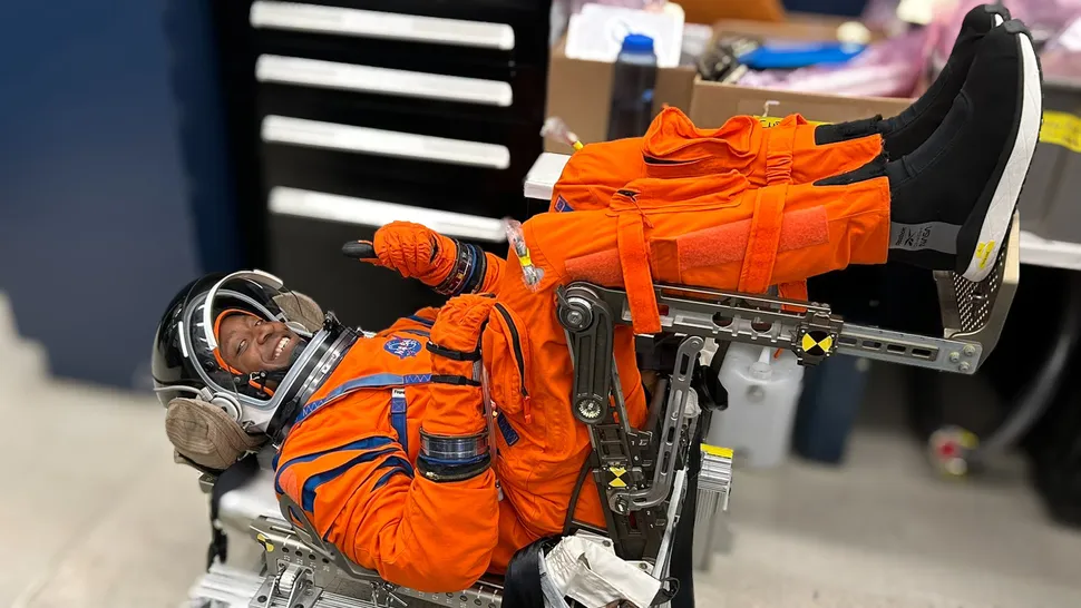 Snazzy Spacesuit! Artemis 2 Moon Mission Backup Astronaut Andre Douglas Tries On His Lunar Duds.